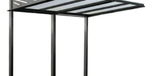 Modulare Fahrradüberdachung Convi® aus feuerverzinktem Stahlrohr mit gewölbtem Polycarbonatdach auf Montageplatten.